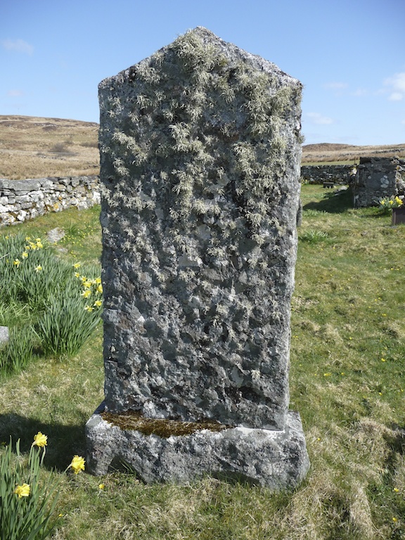 Lichen-covered gravestone