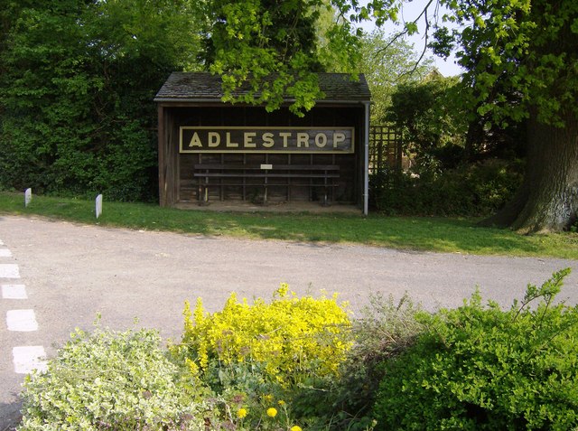 Original Adlestrop station sign, now in a bus stop. Credit Graham Horn via Wikimedia