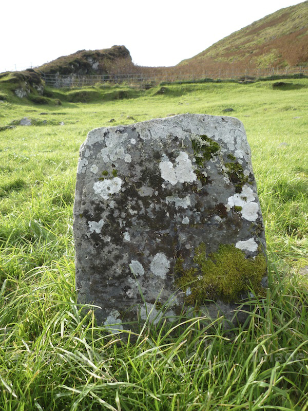 Garvellachs: Lichen on gravestone (see the worn cross?)
