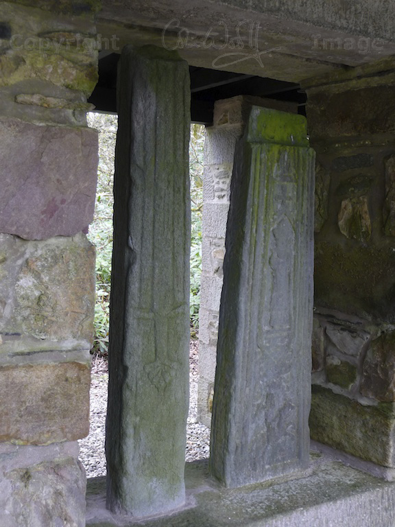 The shaft of the Kilberry Cross is on the right, showing the horseman and the mitred figure